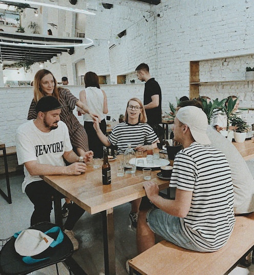 People gathering on a bar